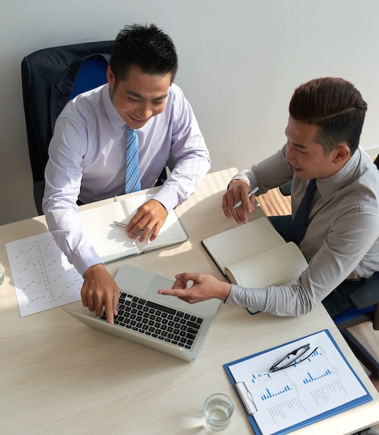 discussing data laptop screen discussing data laptop screen