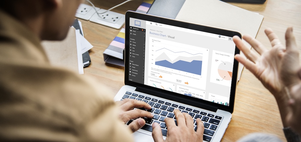 people working on a laptop in a meeting people working on a laptop in a meeting